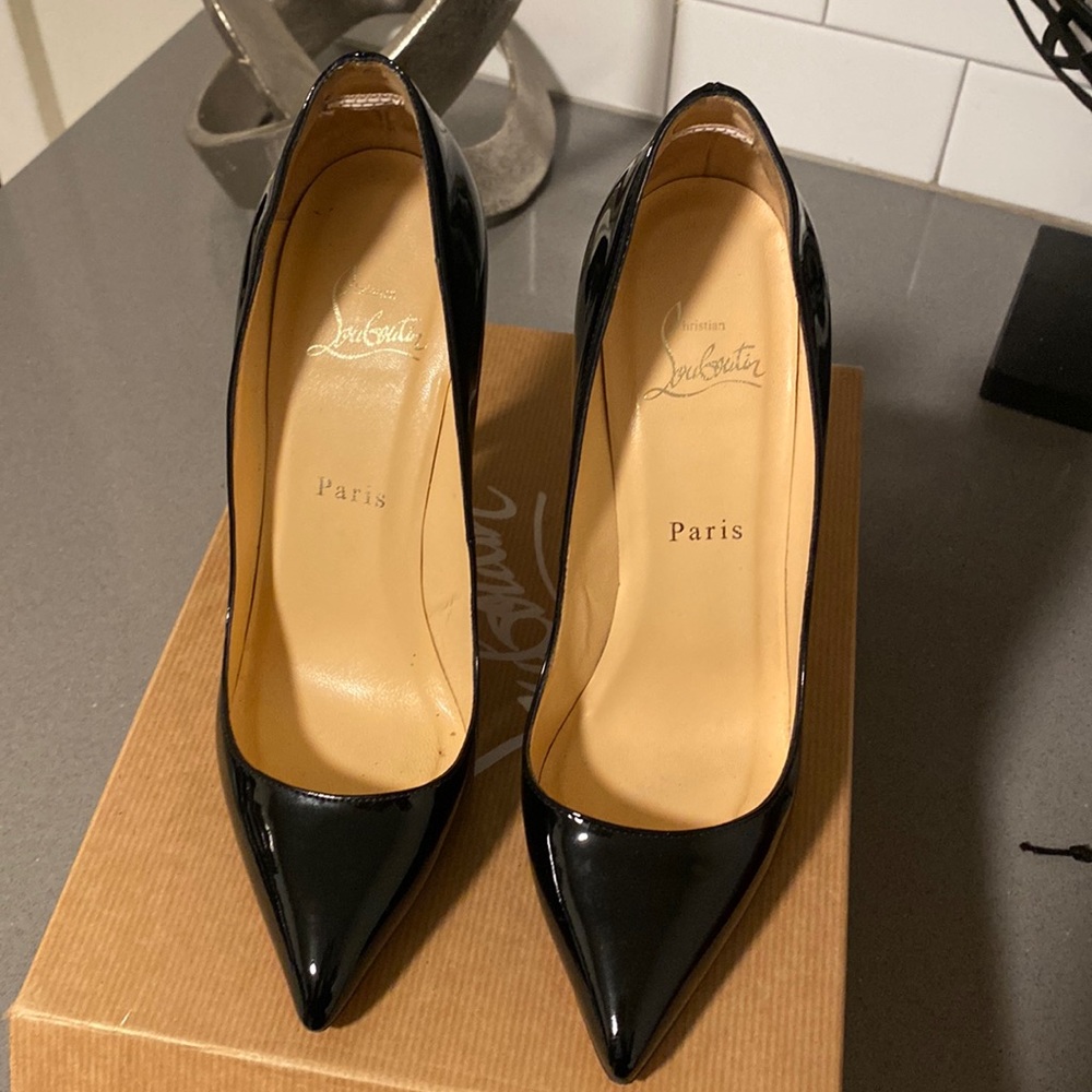 Christian Louboutin Pigalle black patent leather heels. yes they are Authentic